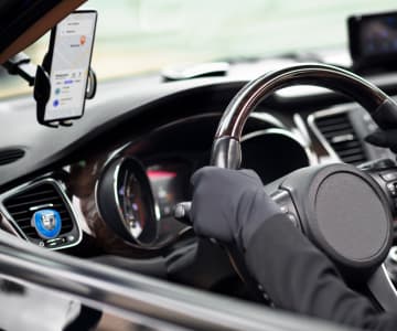 hand on steering wheel